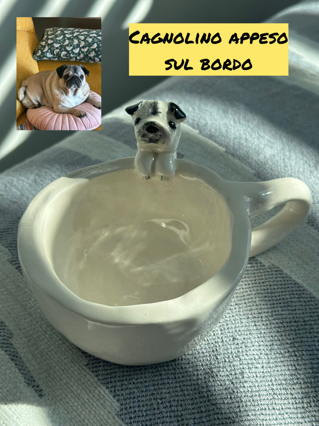 Tazza con animale appeso