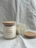Candela in vetro con tappo